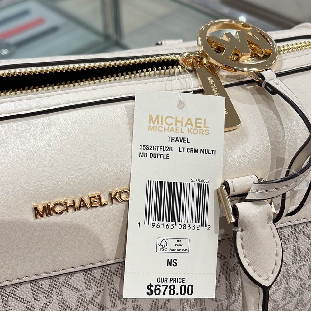 Michael Kors med Duffel Travel - Leather/Coated
35S2GTFU2B
Light Cream Multi - Picture 12 of 16